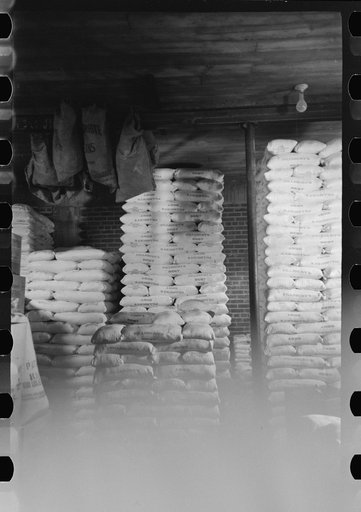 Untitled photo, possibly related to: Flour in railroad freight car at wholesale grocers, San Angelo, Texas