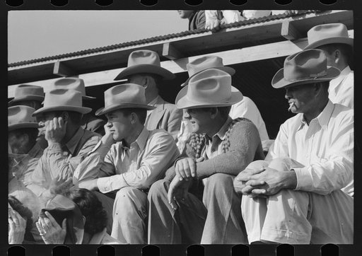 Spectators at a horse sale, Eldorado, Texas