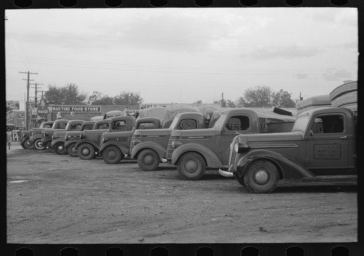 Trucks loaded with mattresses, San Angelo, Texas. These mattress factories use much local cotton