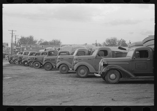 Untitled photo, possibly related to: Trucks loaded with mattresses, San Angelo, Texas. These mattress factories use much local cotton