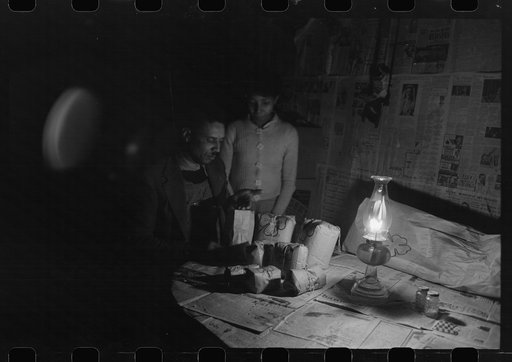 Untitled photo, possibly related to: Pomp Hall family at dinner, Oklahoma