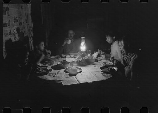 Untitled photo, possibly related to: Pomp Hall family at dinner, Oklahoma