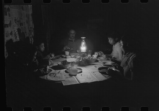 Untitled photo, possibly related to: Pomp Hall family at dinner, Oklahoma