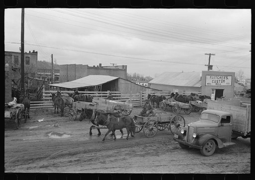 Untitled photo, possibly related to: Lot in which farmers leave their wagons and horses while attending to do business in Eufaula, Oklahoma