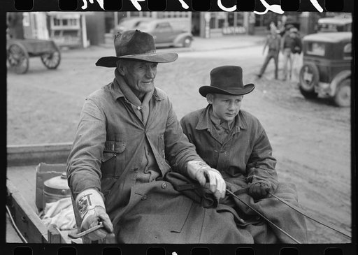Farmer and son arriving in town in wagon, Eufaula, Oklahoma