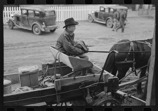 Untitled photo, possibly related to: Farmer and son arriving in town in wagon, Eufaula, Oklahoma
