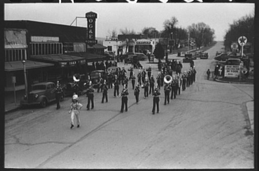 High school band parading down the main street of Eufaula, Oklahoma