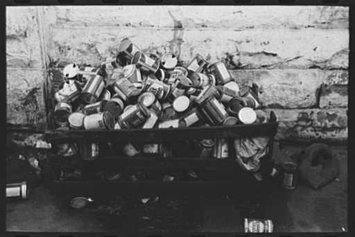 Oil cans at side of filling station, Eufaula, Oklahoma