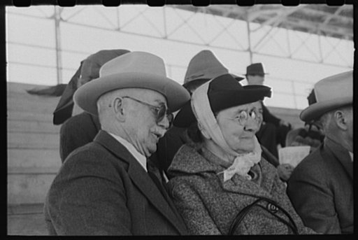 Untitled photo, possibly related to: Elderly couple at the rodeo at the San Angelo Fat Stock Show, San Angelo, Texas