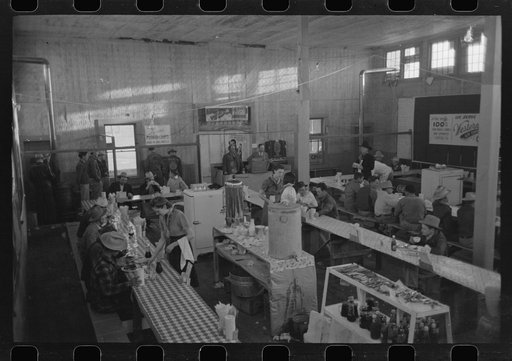 Untitled photo, possibly related to: Cowboys eating breakfast at restaurant on the grounds of the San Angelo Fat Stock Show, San Angelo, Texas