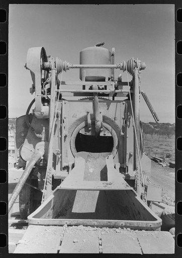 Concrete mixer at road builders' camp, Menard County, Texas