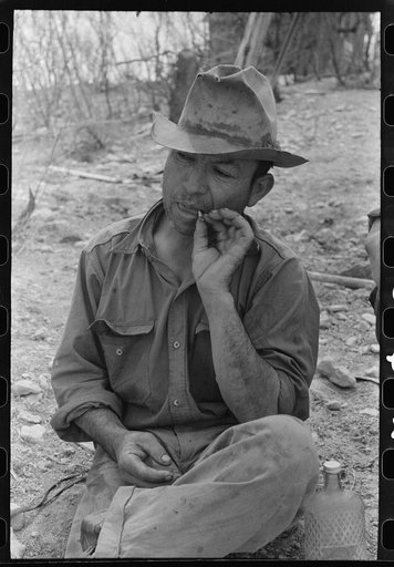 Untitled photo, possibly related to: Professional migratory sheep and goat shearer resting after noonday meal on ranch of rehabilitation borrower in Kimble County, Texas