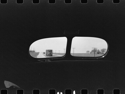 Highway from rear window of automobile in Bexar County, Texas