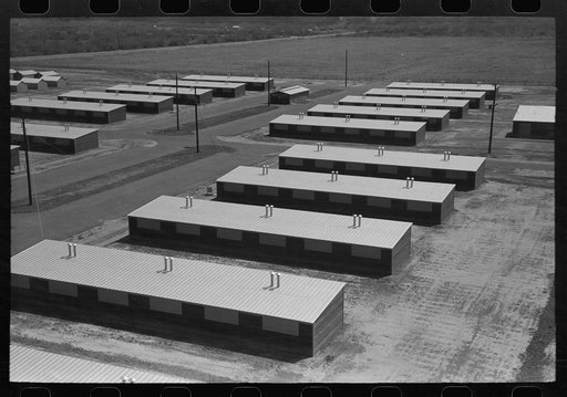 Untitled photo, possibly related to: Row shelters at the migratory camp, Sinton, Texas