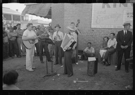 Orchestra playing outside a grocery store on Saturday afternoon which is designed to attract customers to the store, Phoenix, Arizona