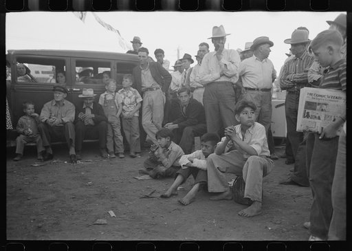 Untitled photo, possibly related to: Audience listening to orchestra playing outside grocery store on Saturday afternoon, Phoenix, Arizona