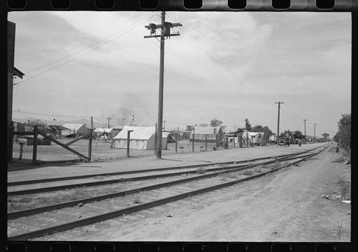 Tents used for dwellings near the railroad tracks in Phoenix, Arizona
