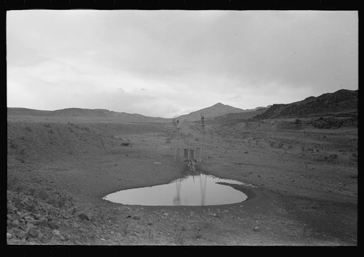 Untitled photo, possibly related to: Stock waterhole and windmill, Socorro County, New Mexico