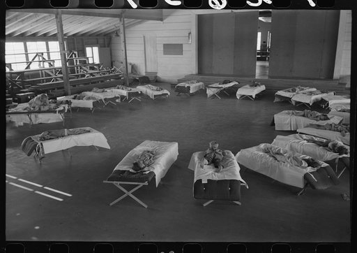 Children of the migratory laborers sleeping at the nursery school at the Agua Fria Migratory Labor Camp, Arizona