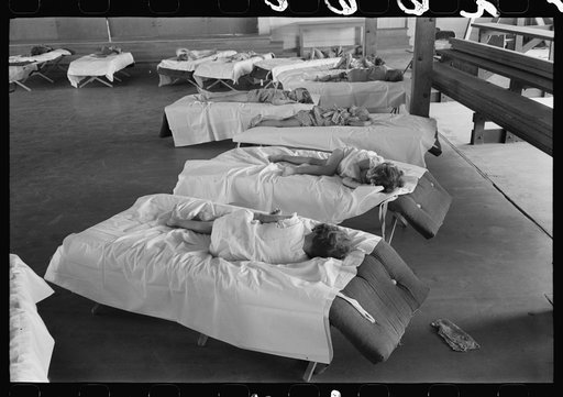 Untitled photo, possibly related to: Children of migratory laborers asleep at the Work Projects Administration nursery school at the Agua Fria Migratory Labor Camp, Arizona