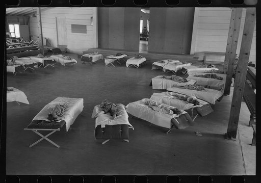 Untitled photo, possibly related to: Children of migratory laborers asleep at the Work Projects Administration nursery school at the Agua Fria Migratory Labor Camp, Arizona
