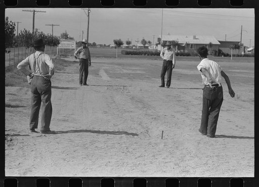 Pitching horseshoes at the Agua Fria Migratory Labor Camp, Arizona