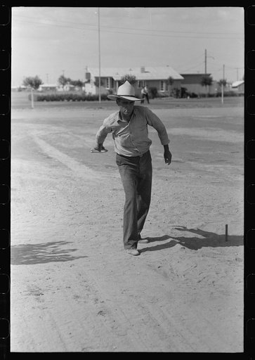 Pitching horseshoes at the Agua Fria Migratory Labor Camp, Arizona