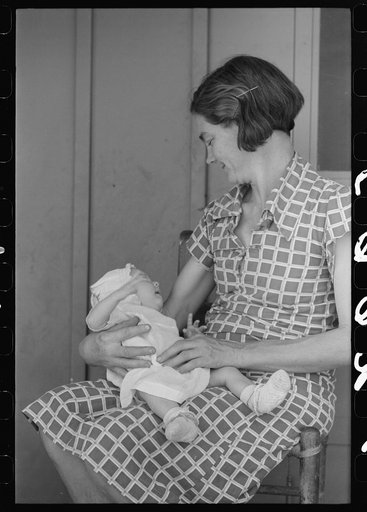 Untitled photo, possibly related to: Mother and child at the Agua Fria Migratory Labor Camp, Arizona