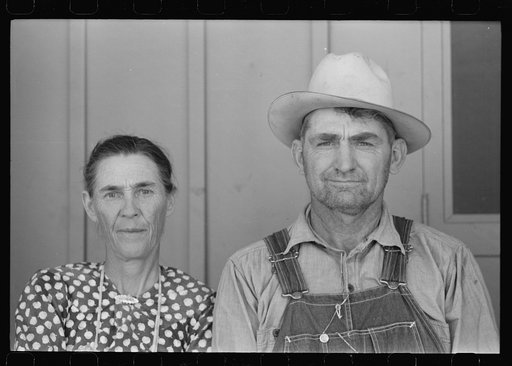 Migratory worker and his wife at the Agua Fria Migratory Labor Camp, Arizona