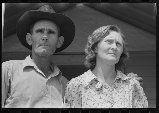 Migratory laborer and his wife at the Agua Fria Migratory Labor Camp, Arizona
