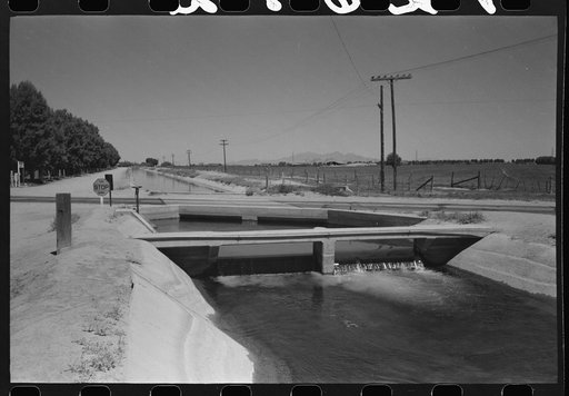 Untitled photo, possibly related to: Irrigation ditch fed by water from deep-driven wells, Maricopa County, Arizona