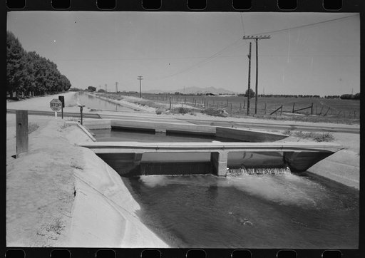 Irrigation ditch fed by water from deep-driven wells, Maricopa County, Arizona
