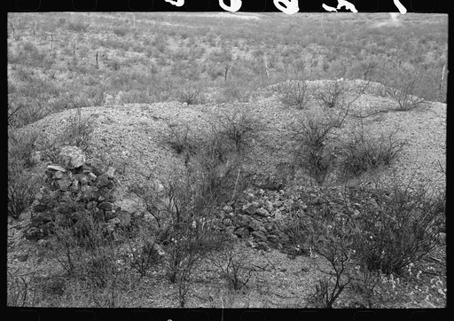 Untitled photo, possibly related to: A prospector's workings in Cochise County, Arizona. Notice the monument at the left