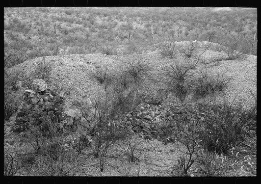 A prospector's workings in Cochise County, Arizona. Notice the monument at the left