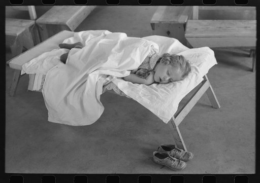 Little girl taking her nap at the Work Projects Administration nursery school at the Casa Grande Valley Farms, Pinal County, Arizona