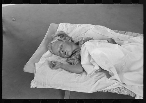 Little girl taking nap at the Work Projects Administration nursery school at the Casa Grande Valley Farms, Pinal County, Arizona