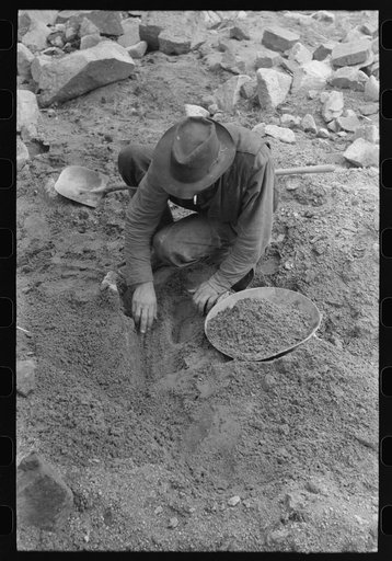 Pinos Altos, New Mexico. Gold prospector working his diggings