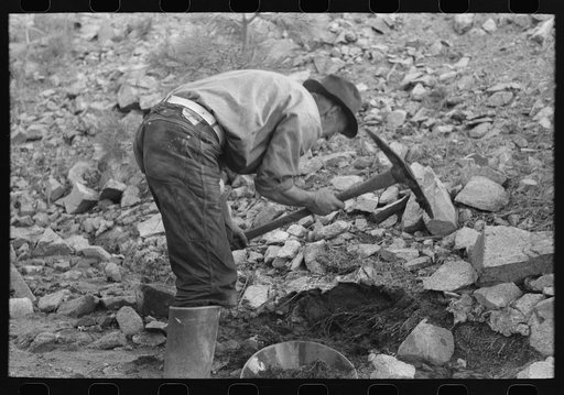 Gold prospector working his diggings. Pinos Altos, New Mexico