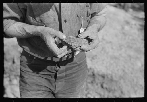 Untitled photo, possibly related to: Piece of ore in hand of prospector, Pinos Altos, New Mexico