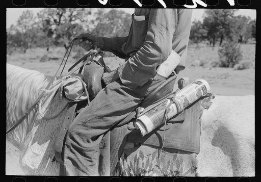 Untitled photo, possibly related to: Detail of homesteader on horseback returning home after trip to town.  There is no R.F.D. service so farmers must make a trip into town for mail. Pie Town, New Mexico
