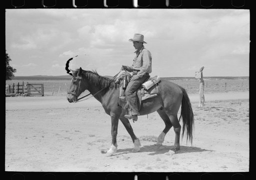 Untitled photo, possibly related to: Cowboy with Spanish cowpony. Pie Town, New Mexico