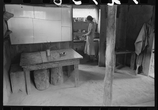 Untitled photo, possibly related to: Woman in adobe house, Pie Town, New Mexico