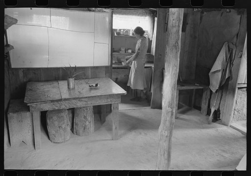 Untitled photo, possibly related to: Woman in adobe house, Pie Town, New Mexico
