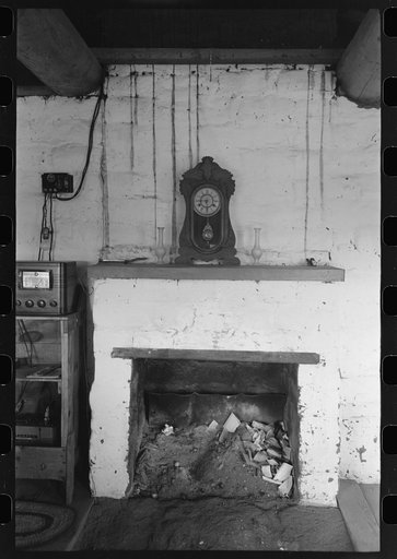 Fireplace and mantle in adobe home of homesteader. Pie Town, New Mexico