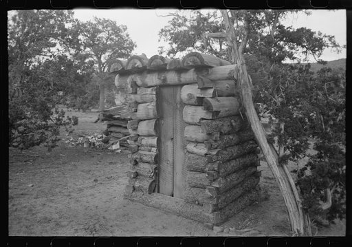 Untitled photo, possibly related to: Log privy on homesteader's farm. Pie Town, New Mexico