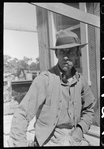 Farmer who is doing some carpentry work for Mr. Craig's new house. Pie Town, New Mexico