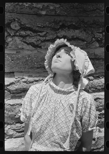 Mrs. Whinery searches the sky for rain clouds. Pie Town, New Mexico