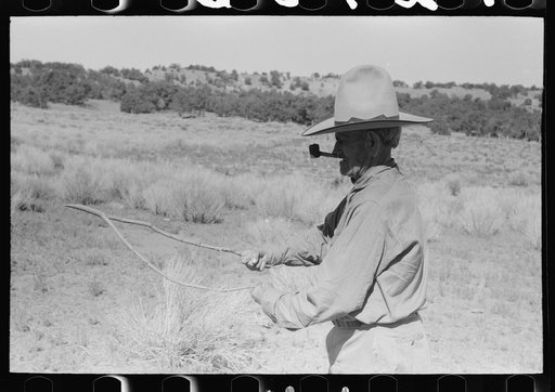 Untitled photo, possibly related to: Water witch. Green forked stick is held firmly thus. Pie Town, New Mexico