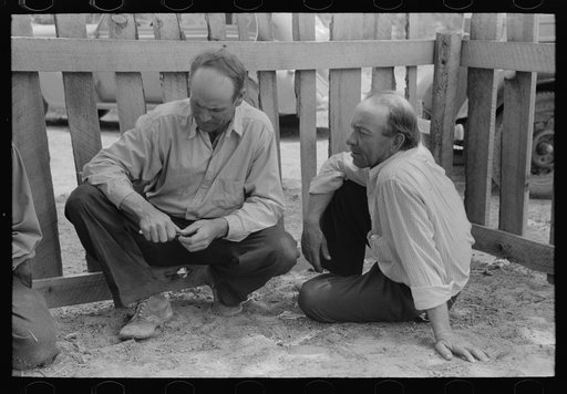 Homesteaders talk in corner of front yard at all day visiting, Pie Town, New Mexico