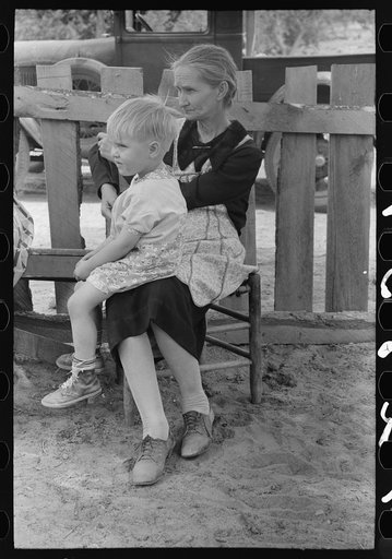 Mrs. Besson, homesteader from Oklahoma, with her grandson; her daughter is married to a homesteader. Pie Town, New Mexico